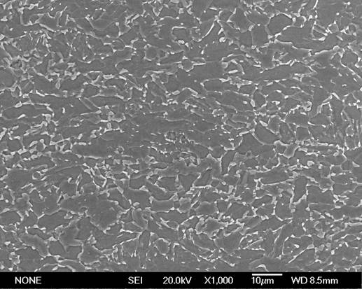 Low-Bauschinger-effect low-strain-aging-effect steel tube and manufacturing method thereof