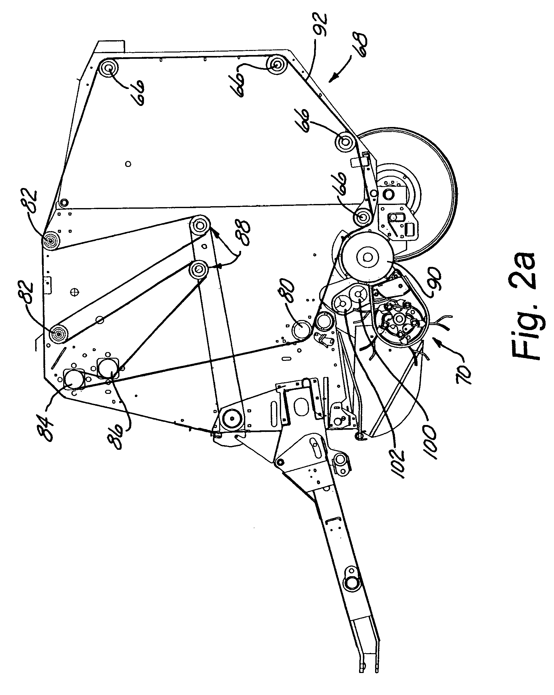 Wide pickup header for a round baler