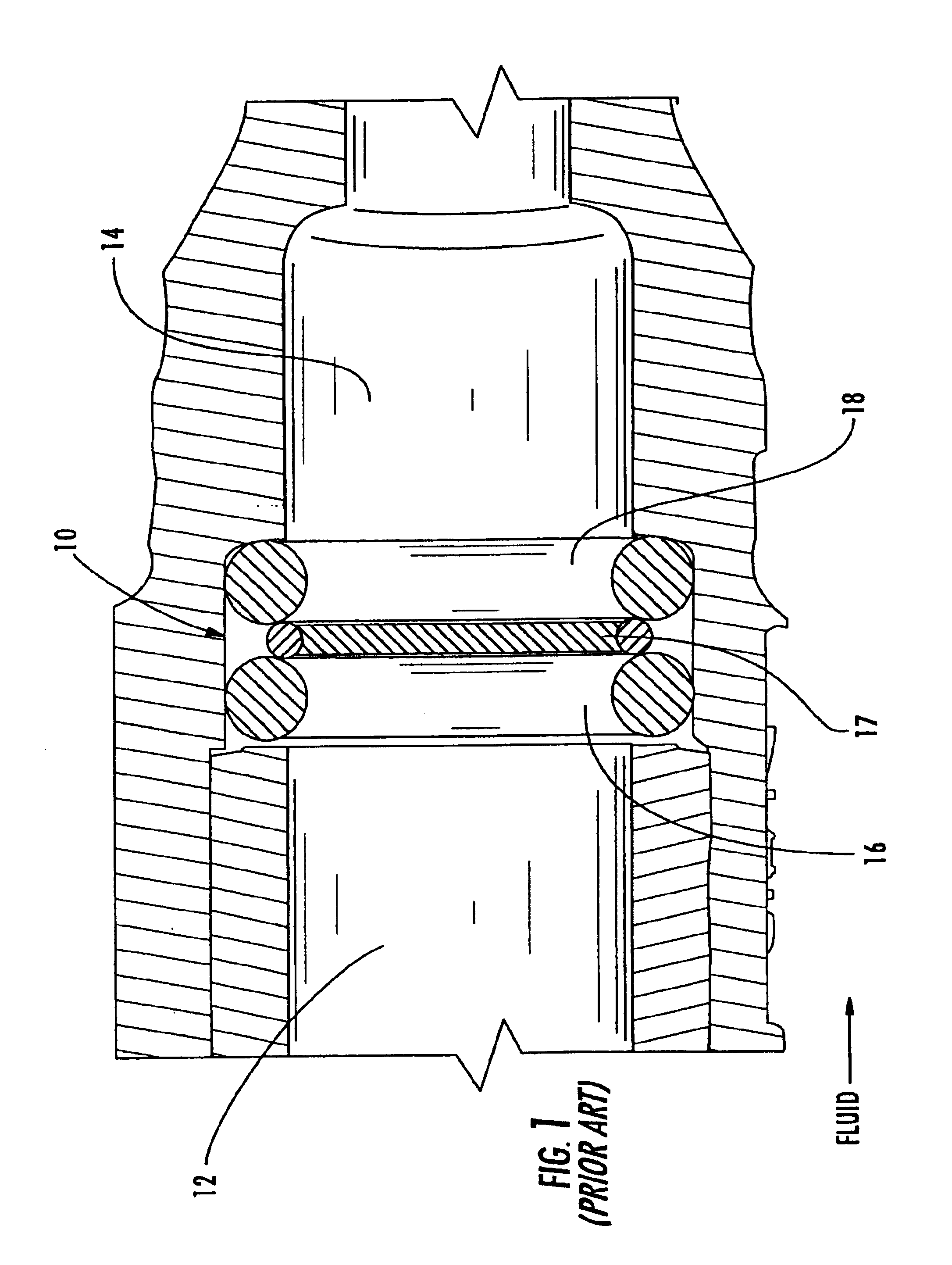 Composite elastomeric seal for sealing fluid lines