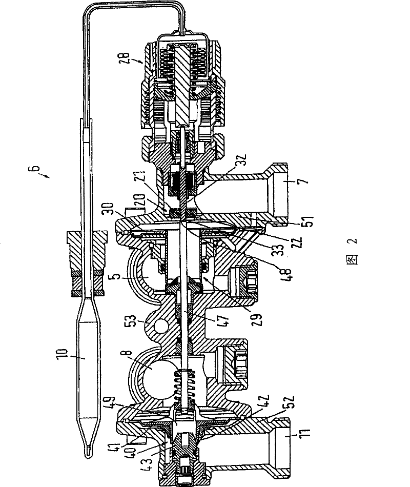 Valve assembly for connecting a heat exchanger of a hot water discharging device to a district heating system