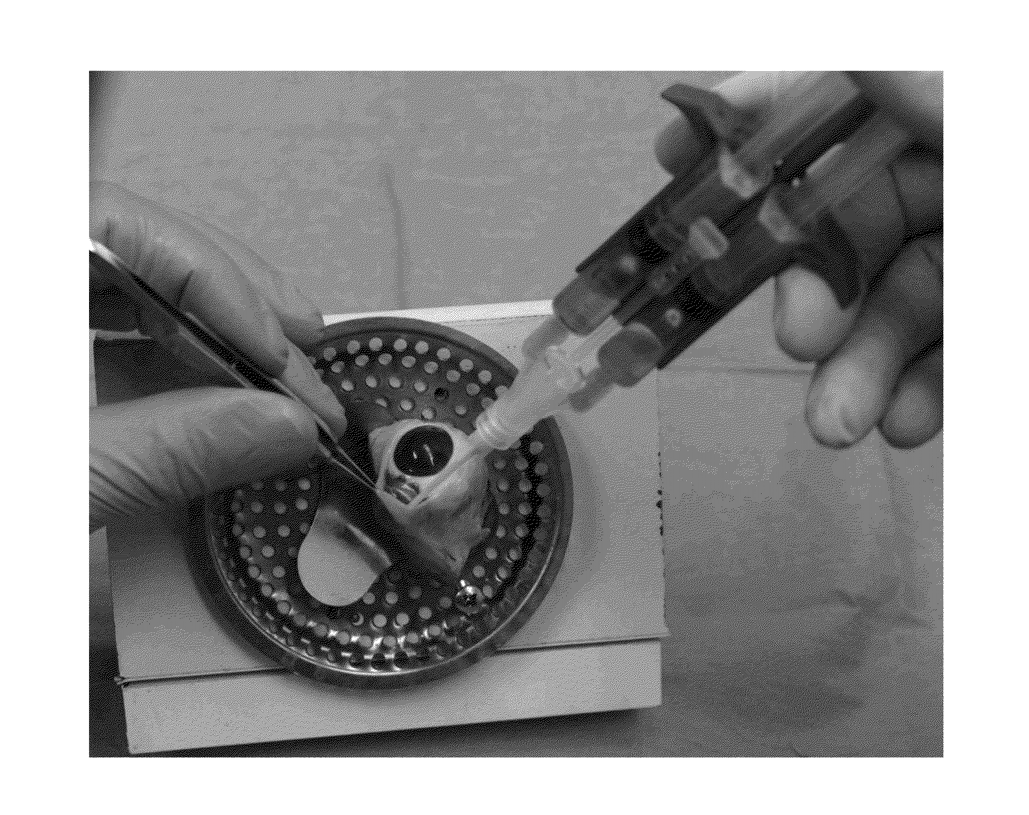 Methods and kits for reversible adhesion of implants to an eye sclera