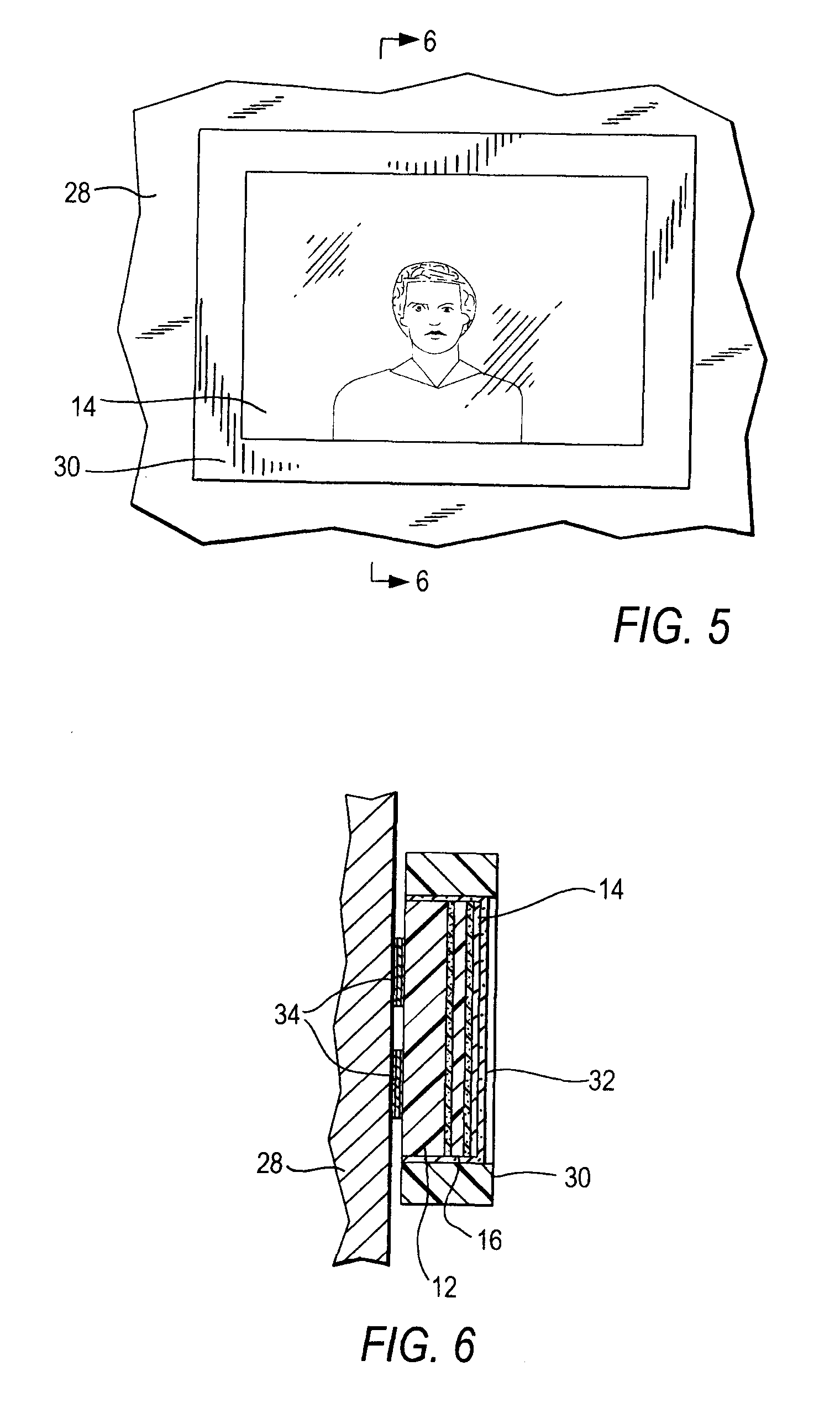 Device for and method of holding and displaying sheet articles