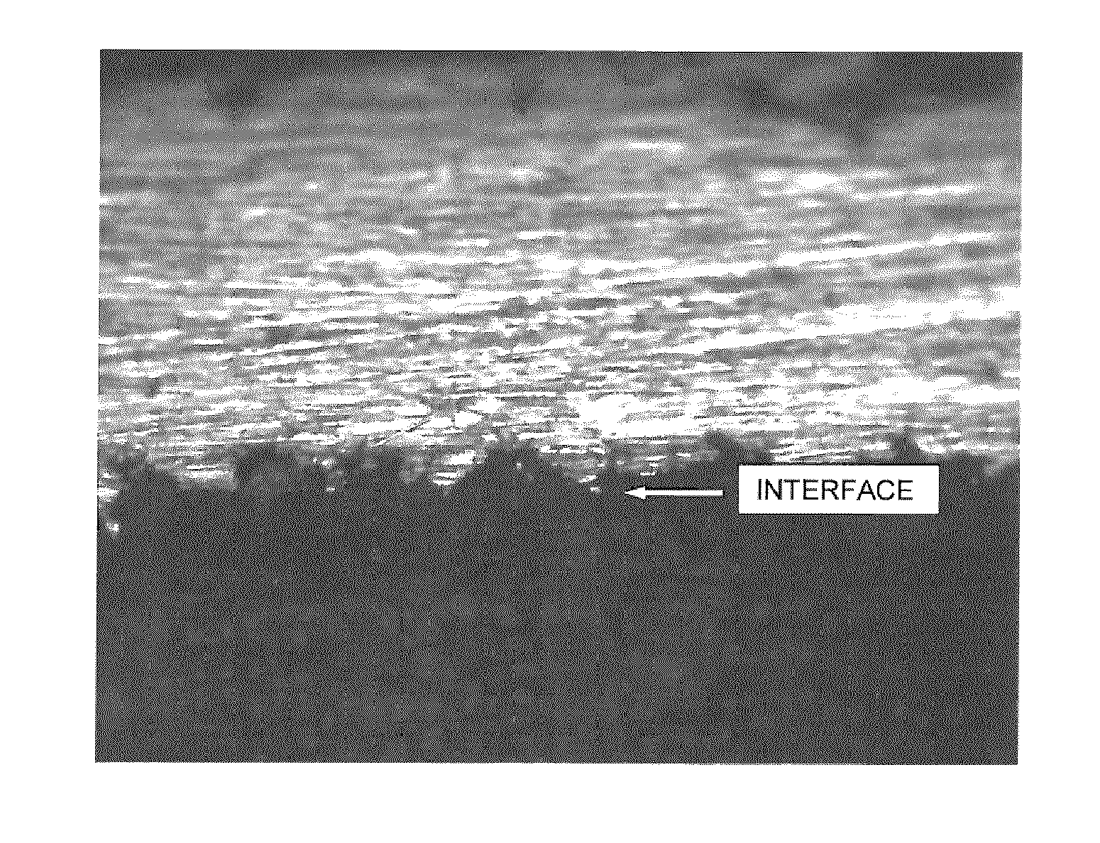 Coatings, coated surfaces, and methods for production thereof