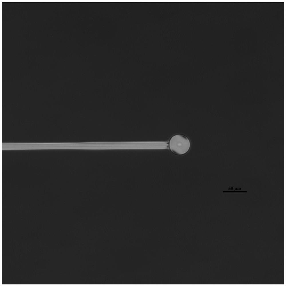 Microspherical cavity laser based on ultra-low threshold multi-component holmium ion-doped glass material