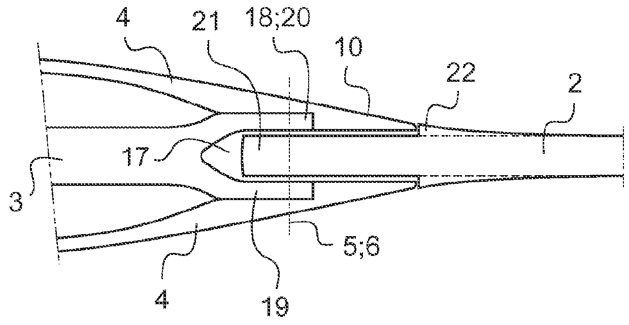 Aerodynamic blade attachment for a bearingless rotor of a helicopter