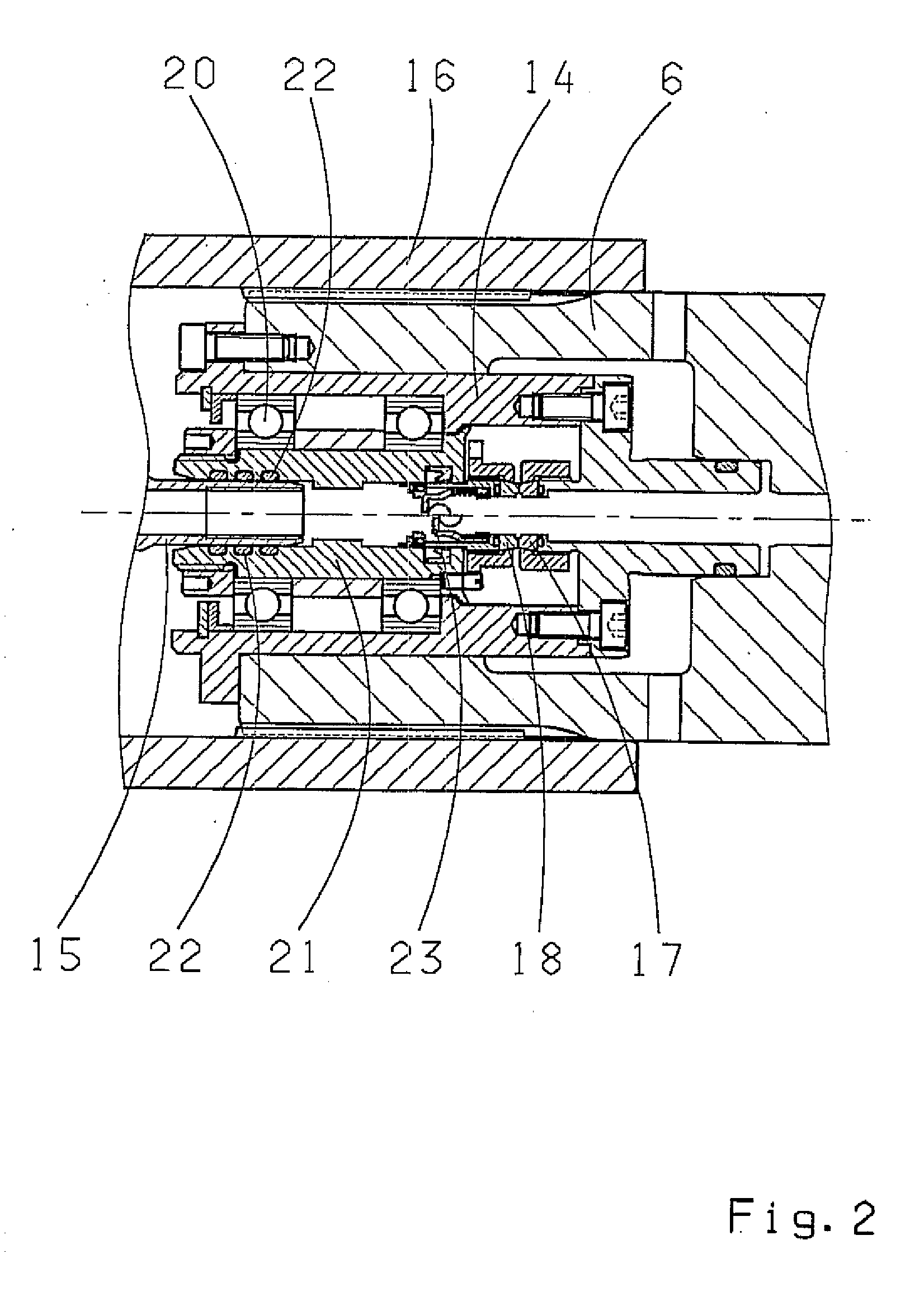 Machine Tool Comprising a Rotary Transmission Leadthrough Between the Driven Gear and the Spindle