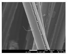 Continuous production process for enabling silver metal to be firmly attached to aromatic special fiber filaments