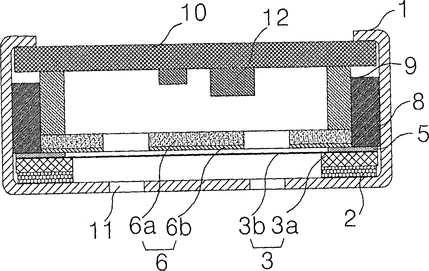 Electret microphone comprising spring washer