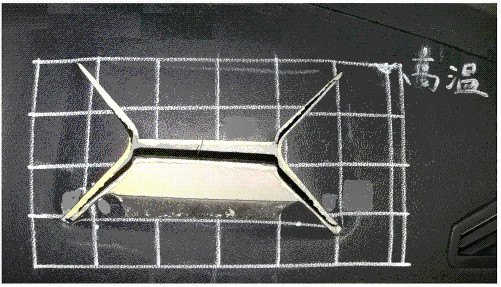 Coating material for improving low temperature explosion performance of PVC slush molded skin, and spraying method thereof