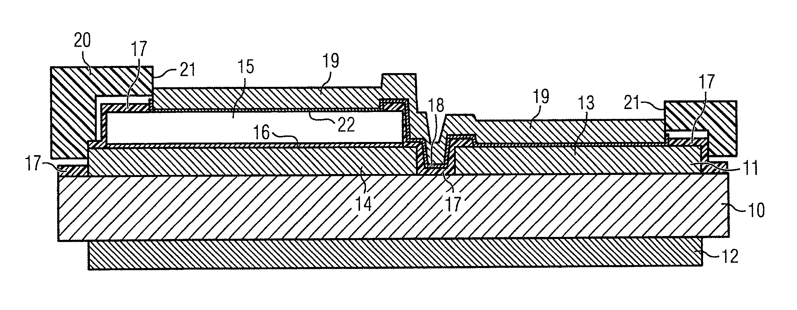 Electronic module and method for producing an electric functional layer on a substrate by blowing powder particles of an electrically conductive material