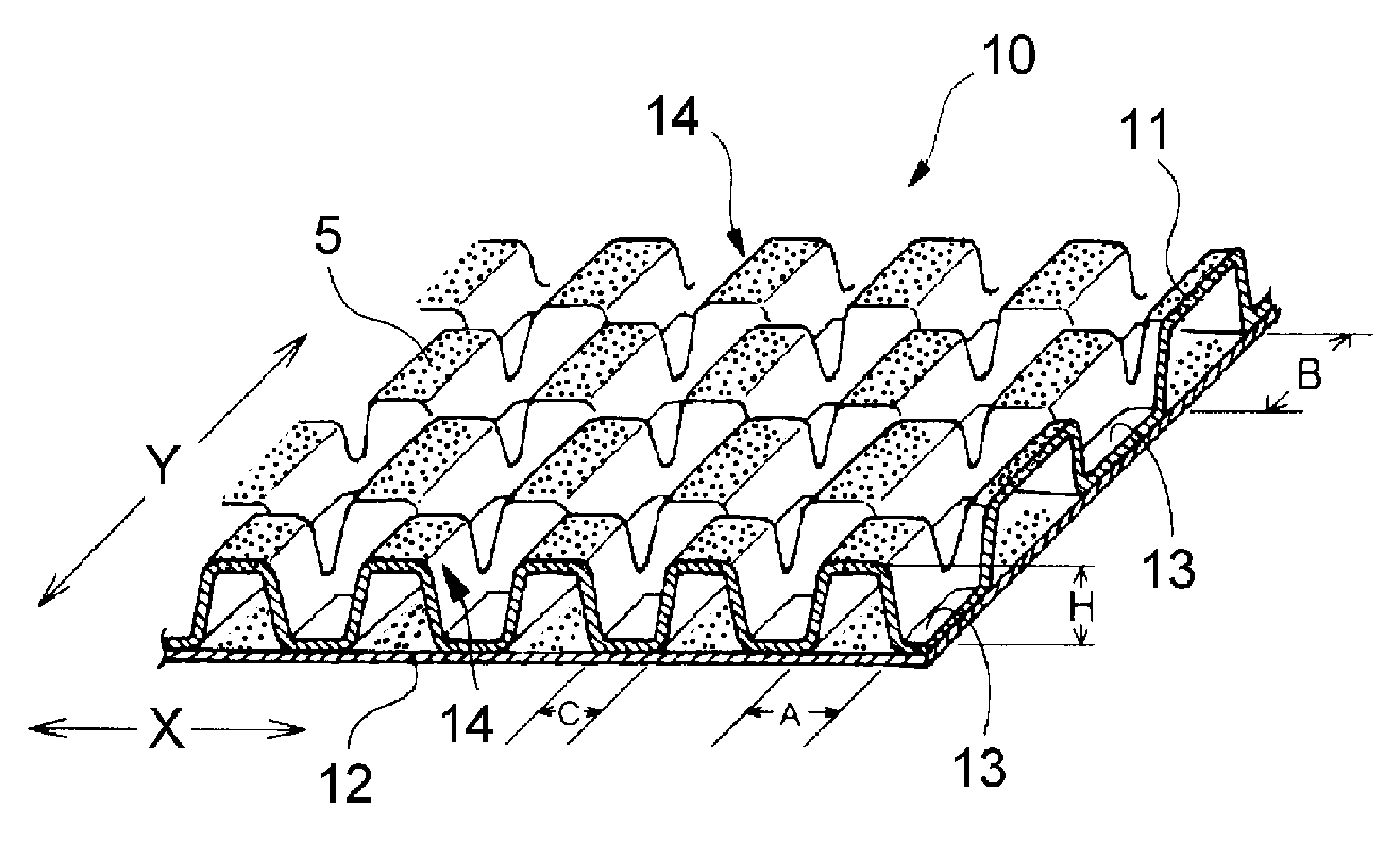 Absorbent article with high and low density portions and skin care agent thereon