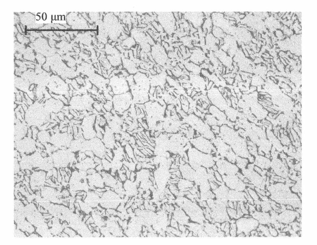 Rolling formation method of large and medium hollow titanium alloy disc-shaped forge piece