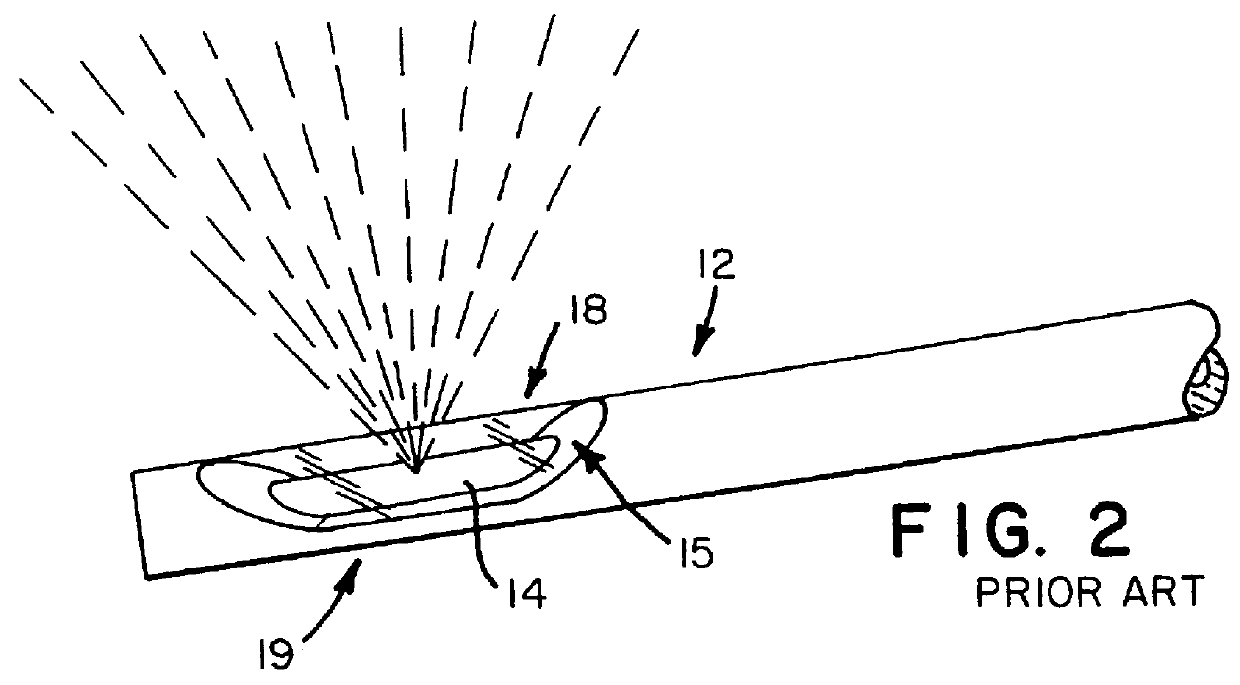 Laser therapy system and method of cutting and vaporizing a tissue body