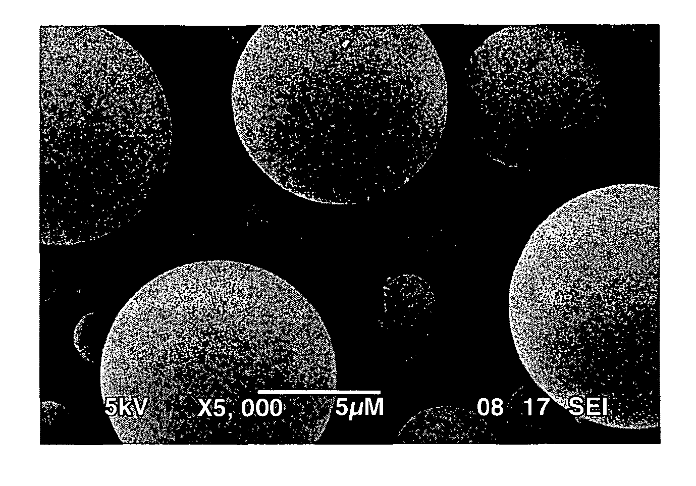 Porous inorganic/organic hybrid particles having high organic content and enhanced pore geometry for chromatographic separations