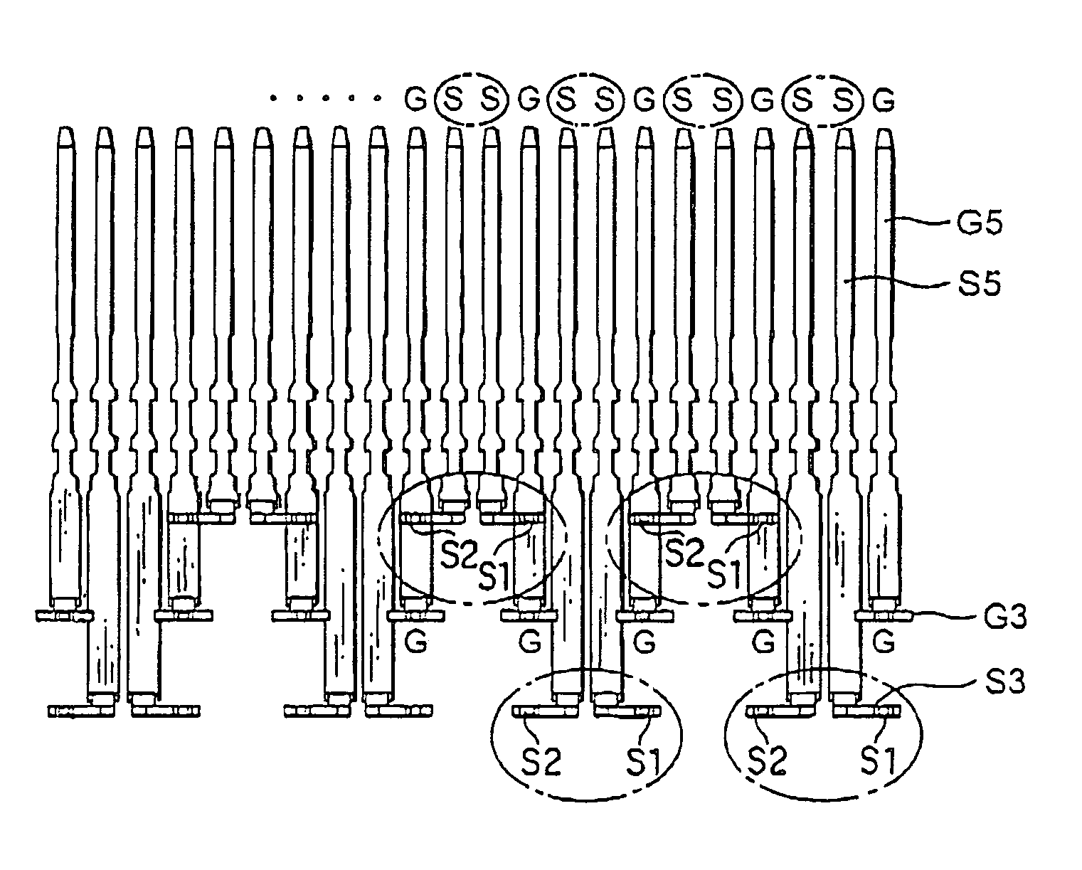 Connector in which a balance in physical distance between a ground contact and a pair of signal contacts can be maintained