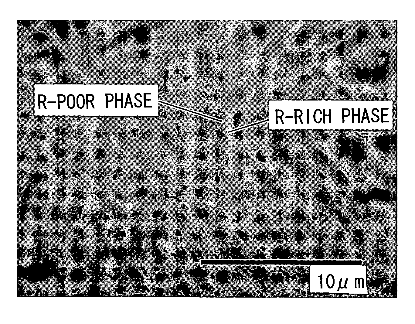 Alloy containing rare earth element, production method thereof, magnetostrictive device, and magnetic refrigerant material