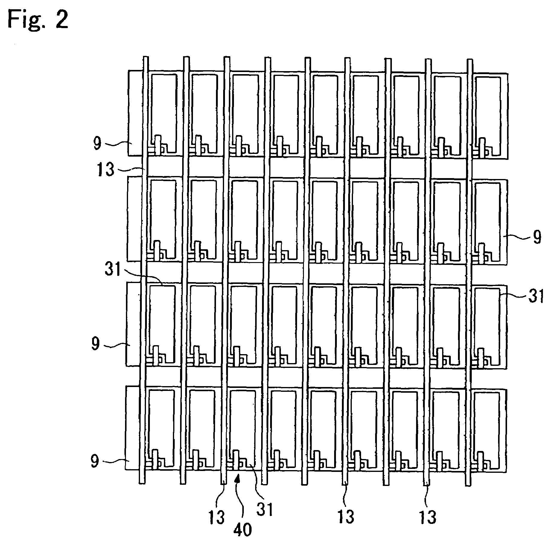 Vertical alignment mode LCD with larger dielectric protrusions in transmissive region than in reflection region