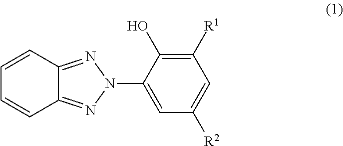 Polymer interlayers comprising UV absorbers