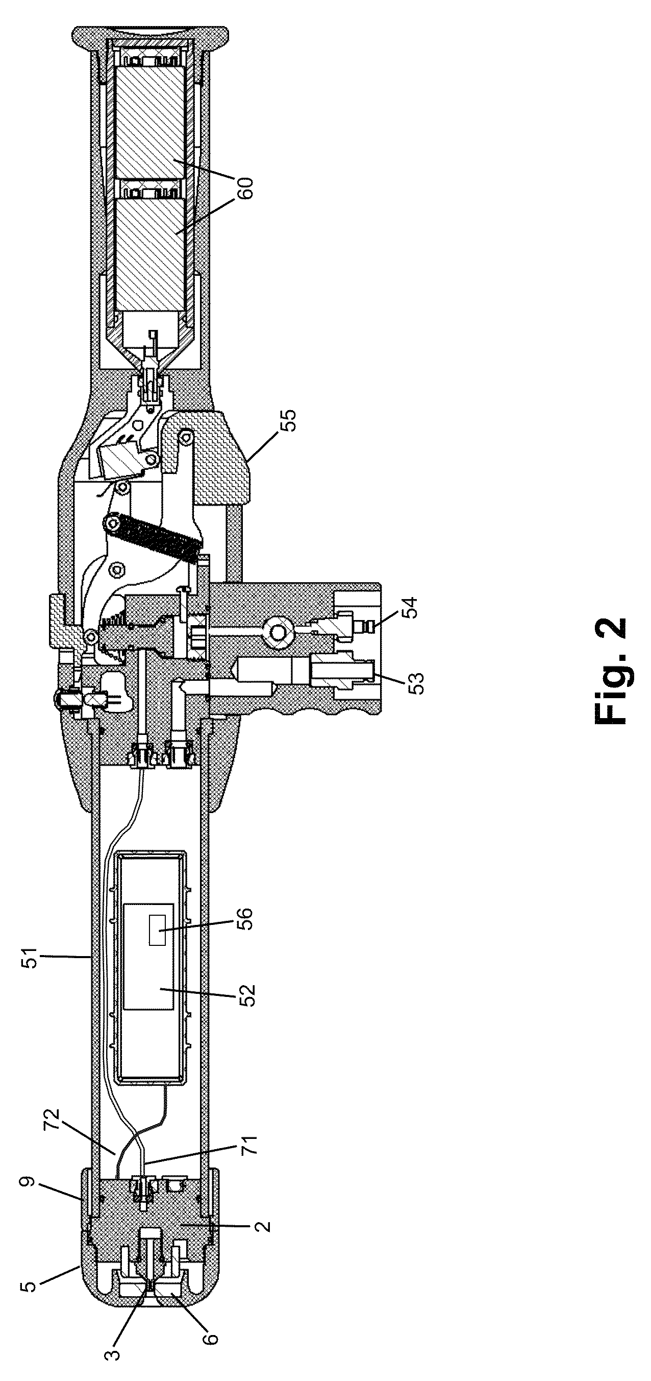 Electrostatic liquid spray nozzle having an internal dielectric shroud