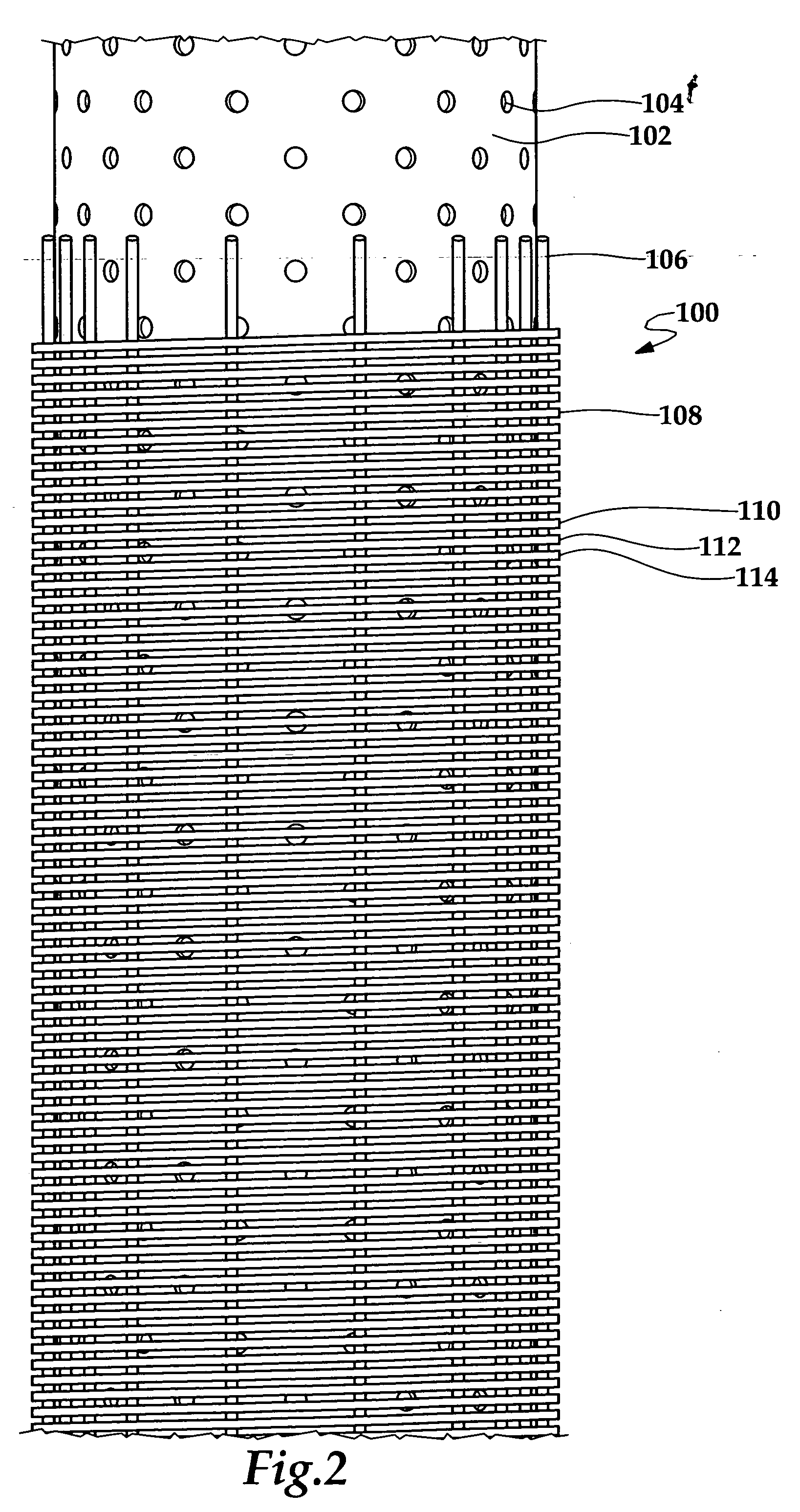 Apparatus and method for reducing water production from a hydrocarbon producing well