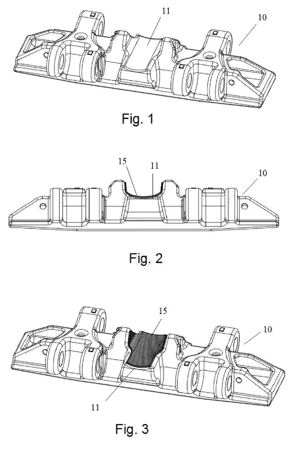 Explosive hardening of track shoes