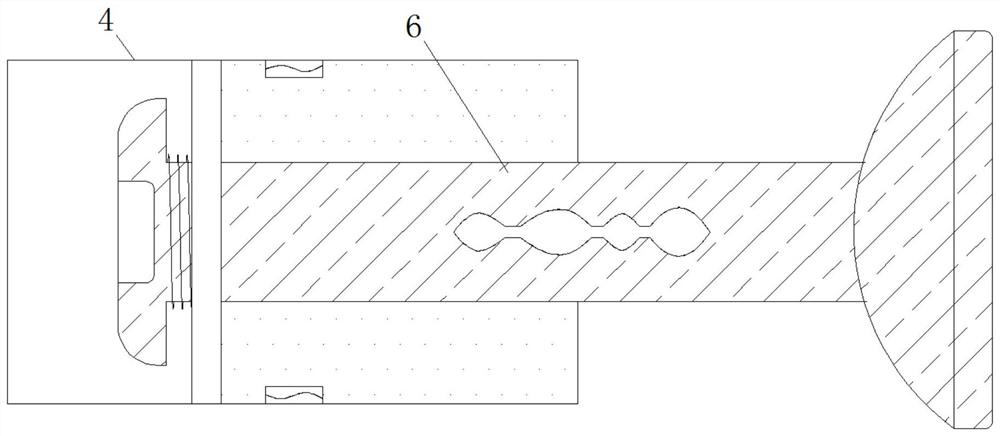 An auto parts grinding device capable of automatic cleaning and clamping