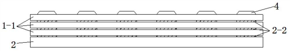 Point laying periodic cushion layer vibration reduction ballast bed