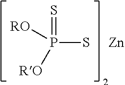 Lubricating oil compositions containing sterically hindered amines as ashless TBN sourcces