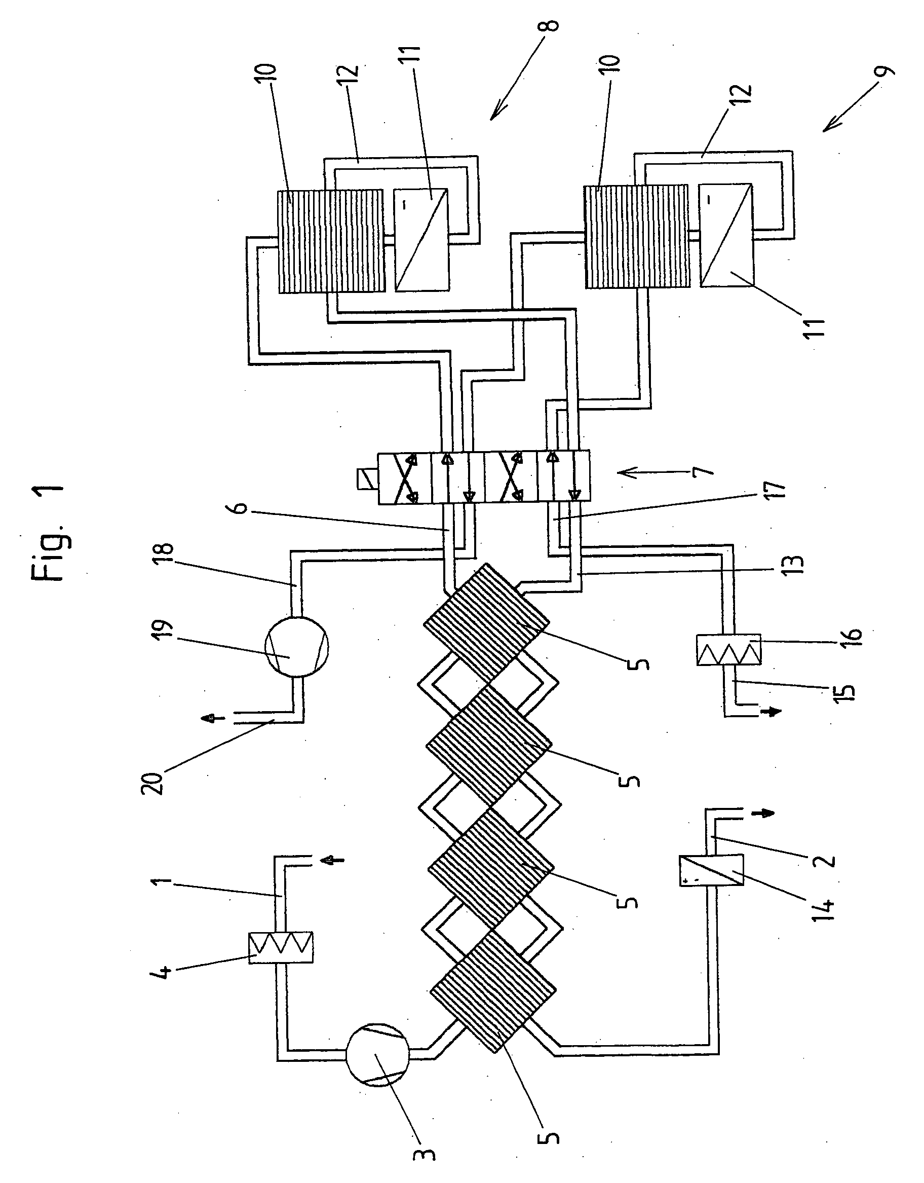 Drying device for drying a gas