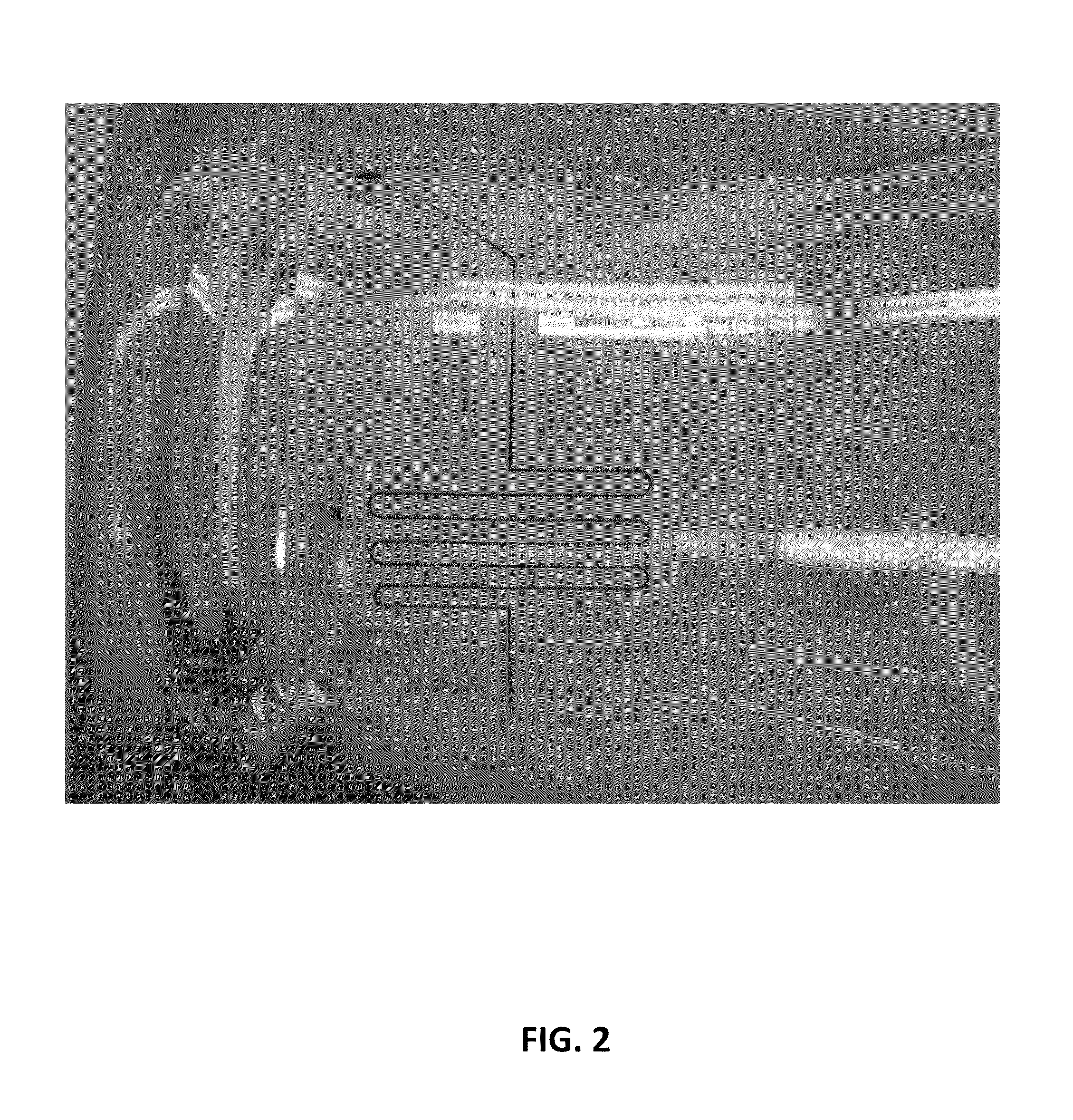 Reversible bonding of microfluidic channels using dry adhesives