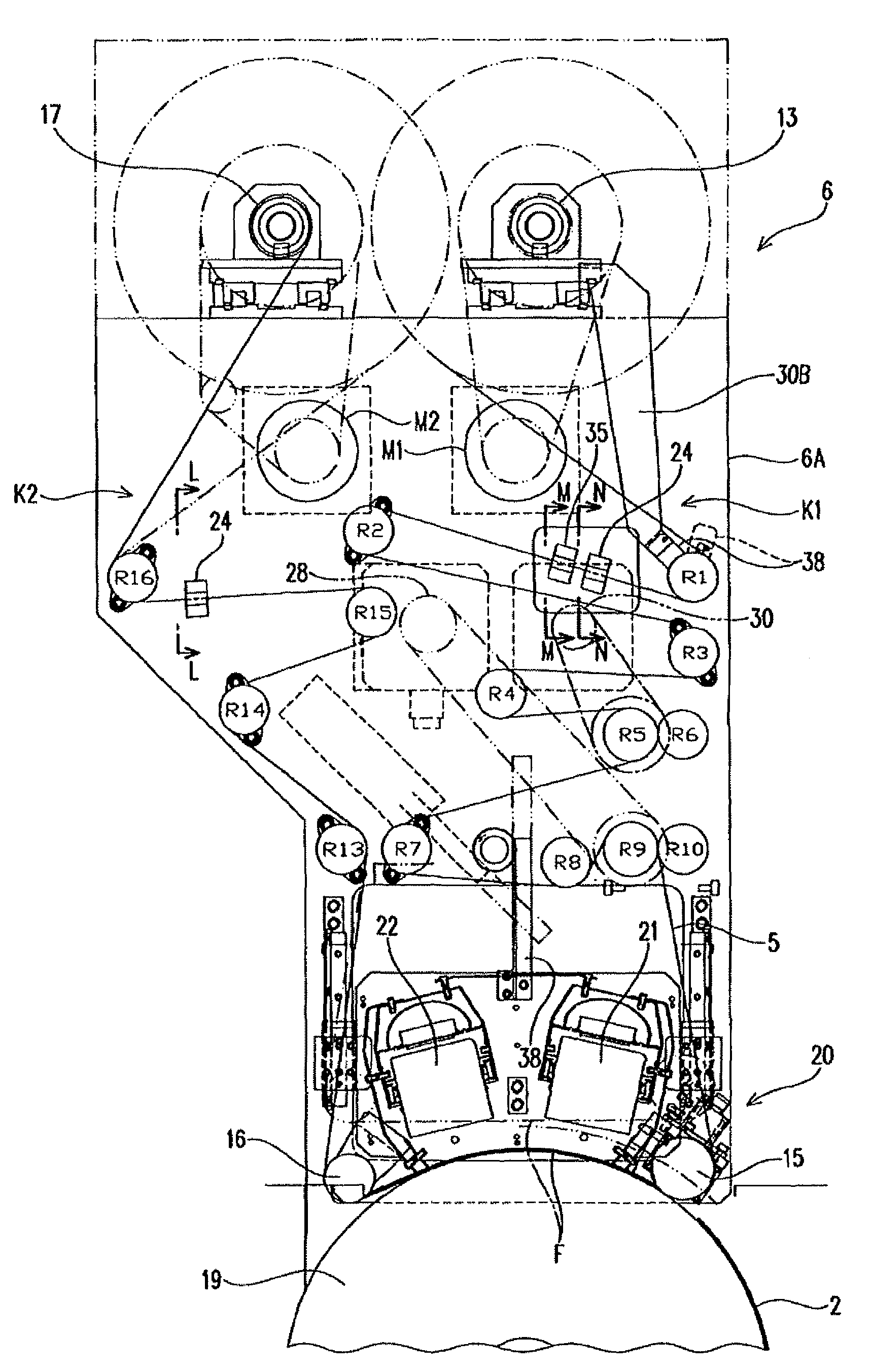 Method of winding up transfer film and device for performing transfer printing on printed sheets of paper