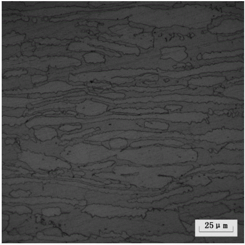 Carbon steel and duplex stainless steel composite steel plate and production method thereof