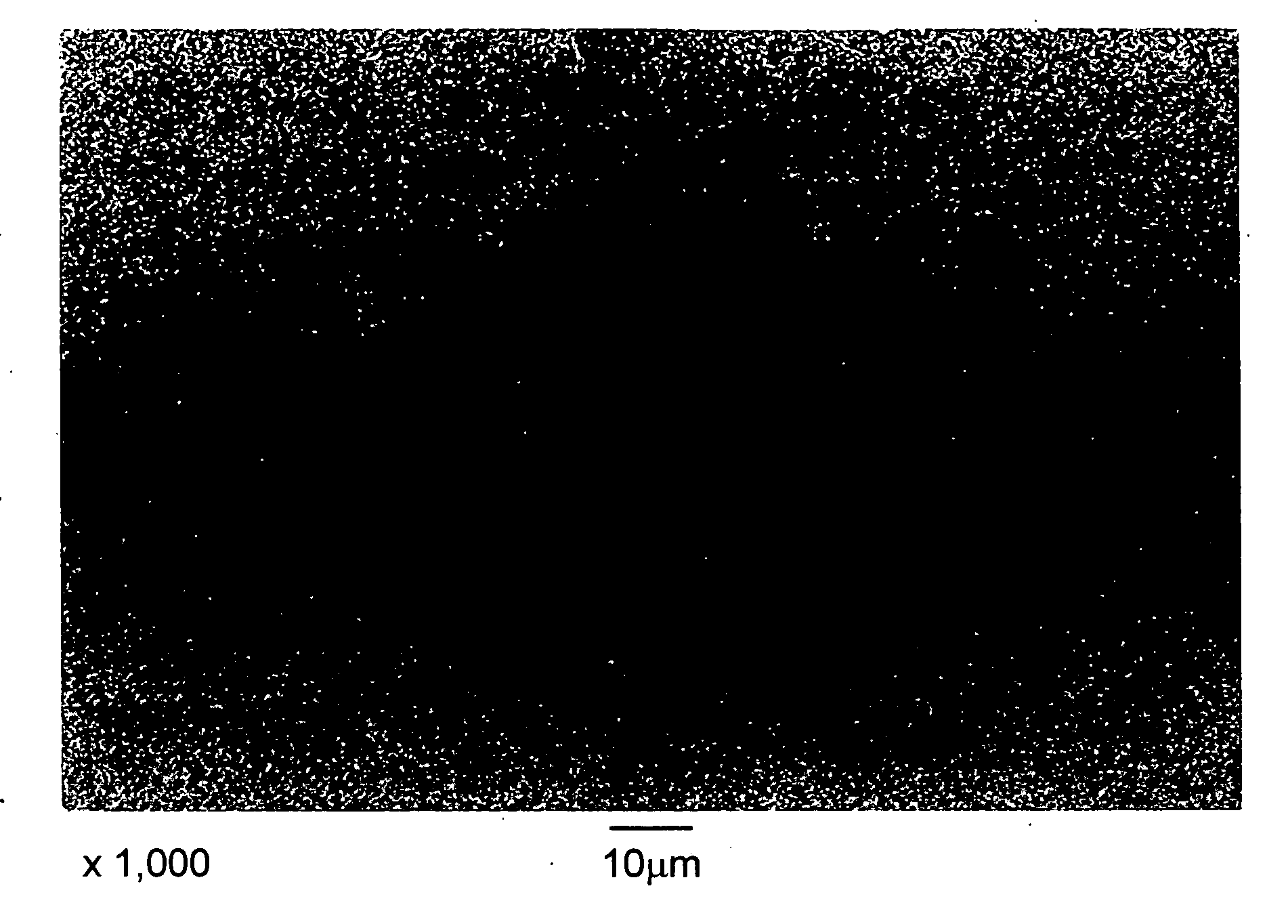 Electrolytic copper foil with low roughness surface and process for producing the same