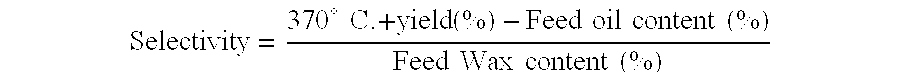 Wax isomerate yield enhancement by oxygenate pretreatment of feed