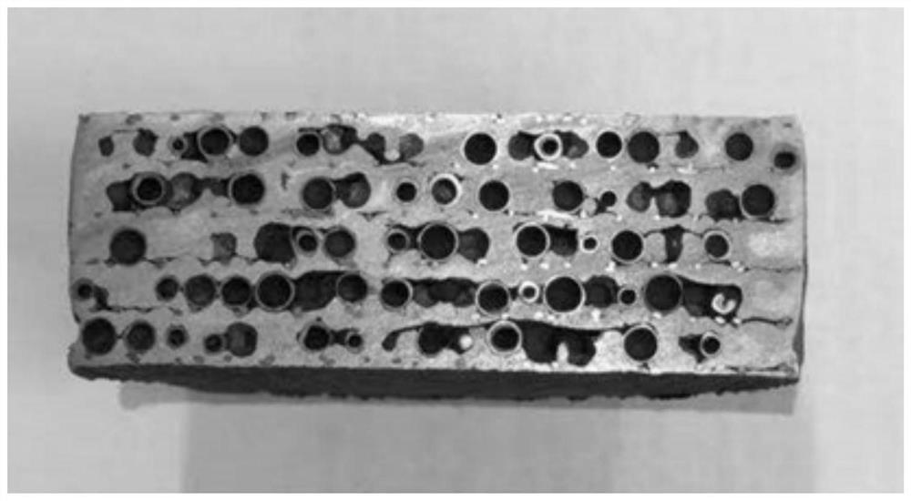 Preparation method of metal hollow sphere composite with grid-reinforced structure