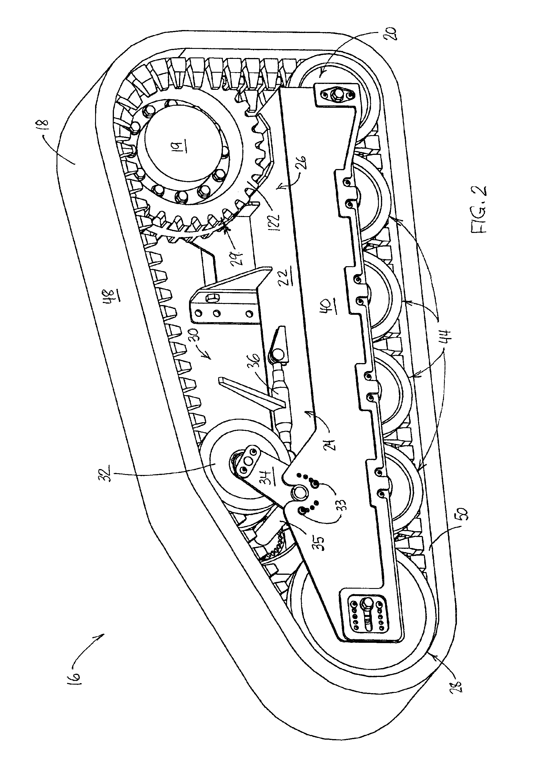 Track and track assembly for a track laying vehicle