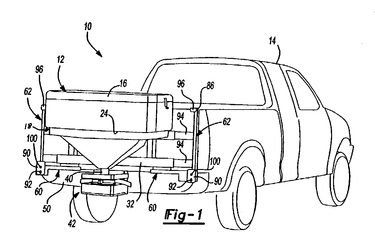 Mounting assembly for supporting a hopper and a spreading mechanism on a vehicle