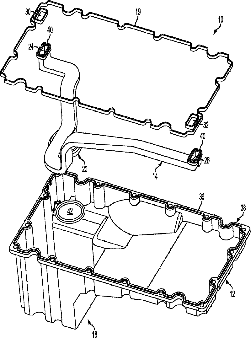 Reversible oil pan with integrated oil suction tube