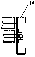 Mechanism preventing middle portion of bearing surface of flat belt conveyer from deviating