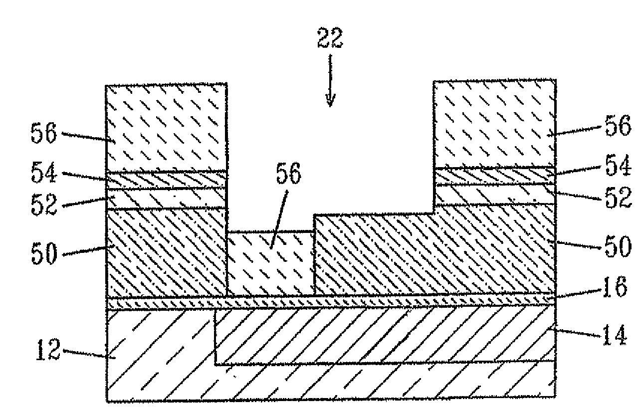 Use of a porous dielectric material as an etch stop layer for non-porous dielectric films