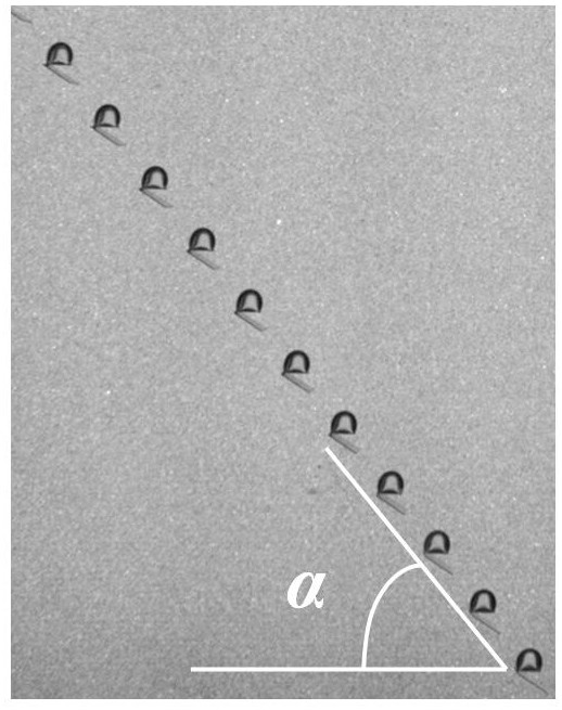 Method for controlling free rising track and speed of bubble by using empennage