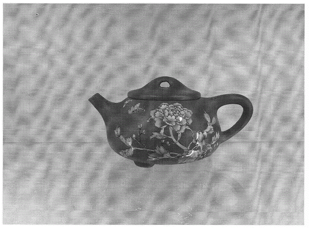 Method for drawing enamel on purple stoneware