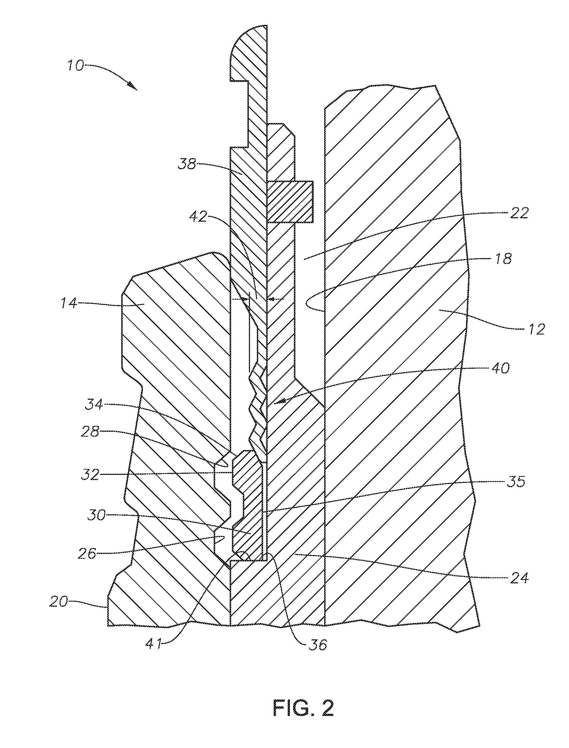 Corrugated energizing ring for use with a split lockdown ring