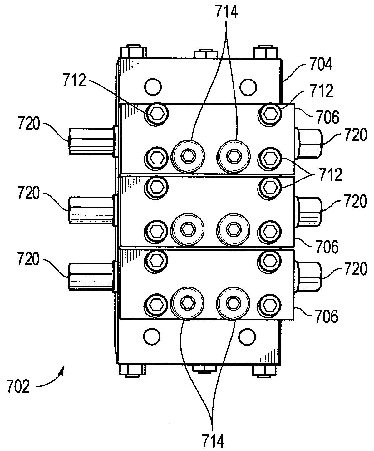 Fluid divider block suitable for use at high pressures