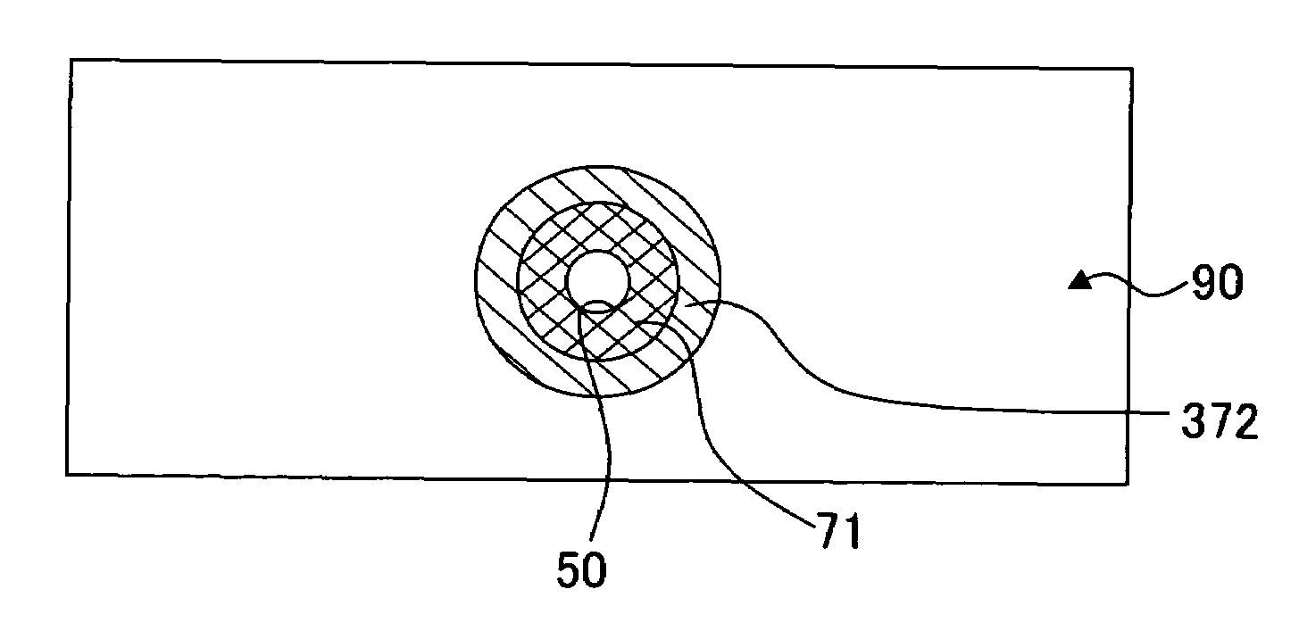 Liquid droplet jetting apparatus having liquid-repellent jetting surface, nozzle plate having liquid-repellent jetting surface, and method for producing the nozzle plate