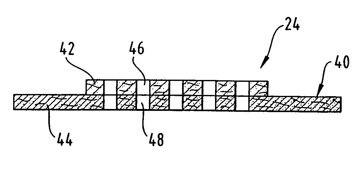 Apertured laminate web