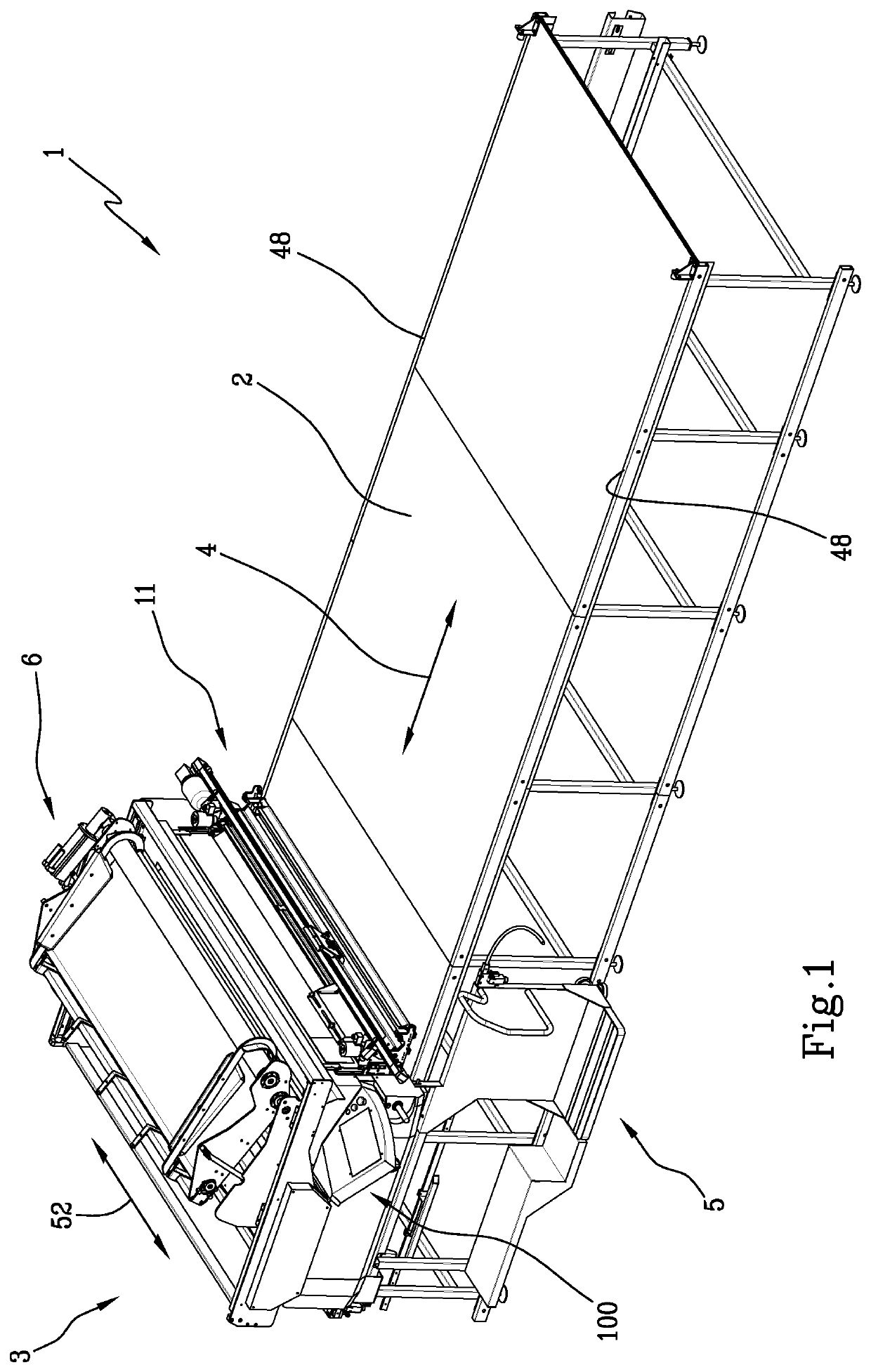 Machine for spreading fabric