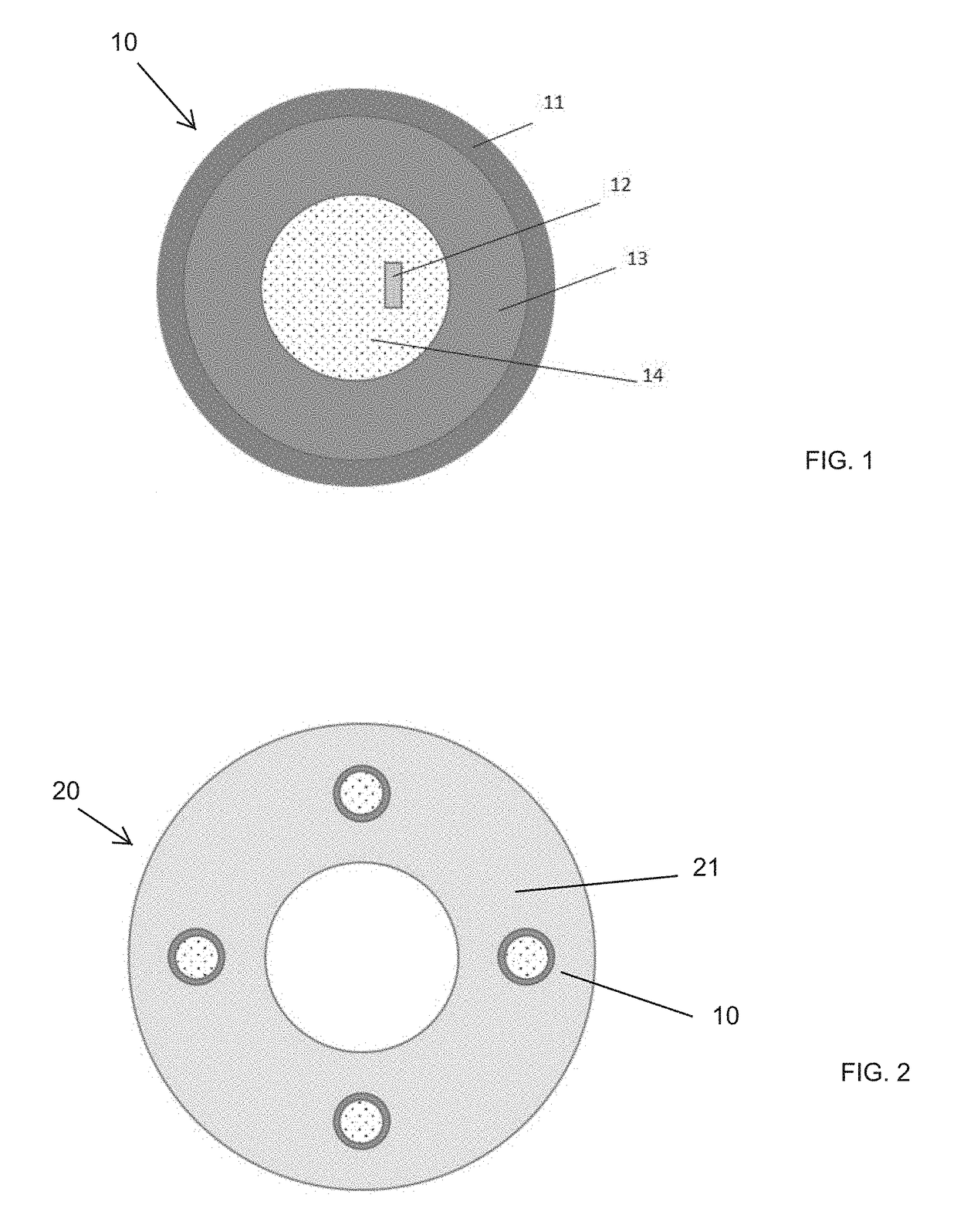 Downhole tools having controlled degradation and method