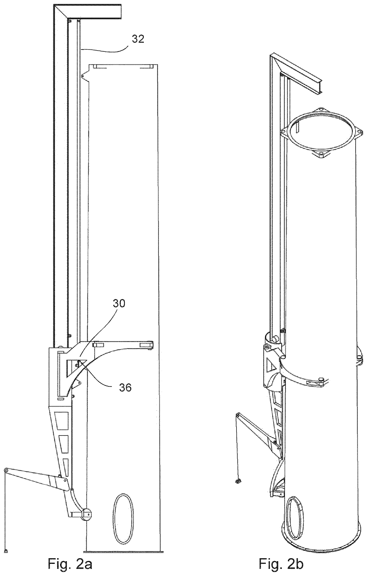 Wind turbine tower with crane connection elements and a crane with tower flange connection elements