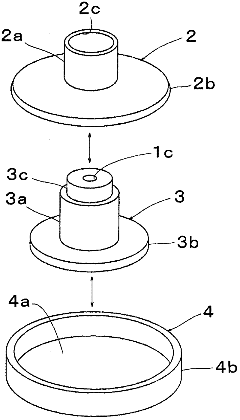 Button assembling device and button assembling method